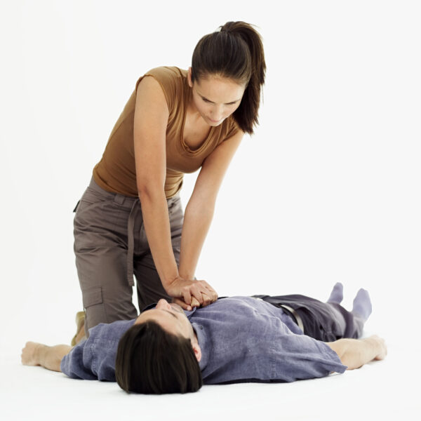 woman practicing CPR